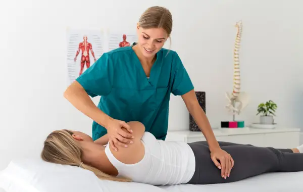 Manual therapy session to improve shoulder mobility and reduce pain.
